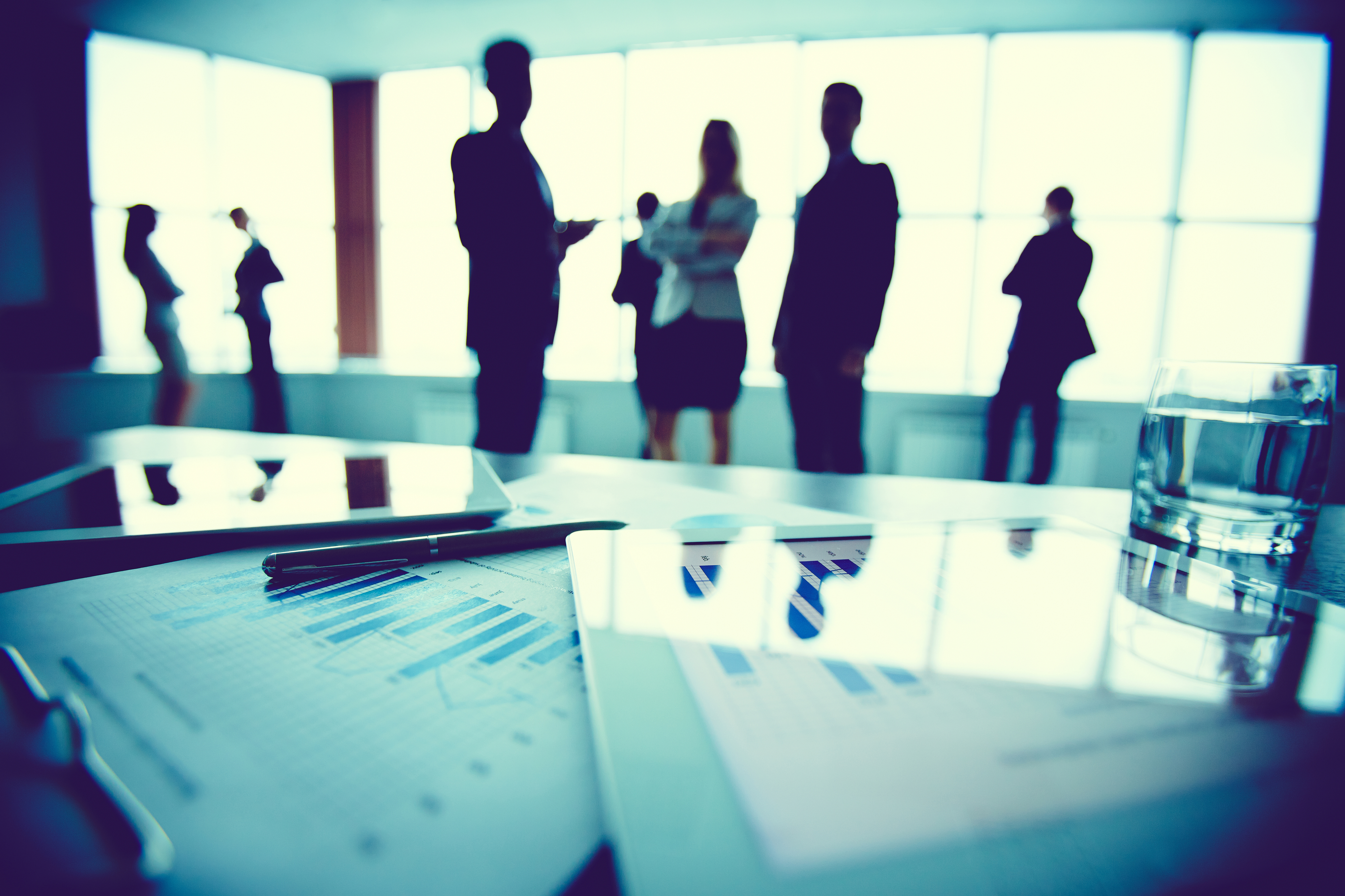 Documents on table Workplace Automation for Today and the Future